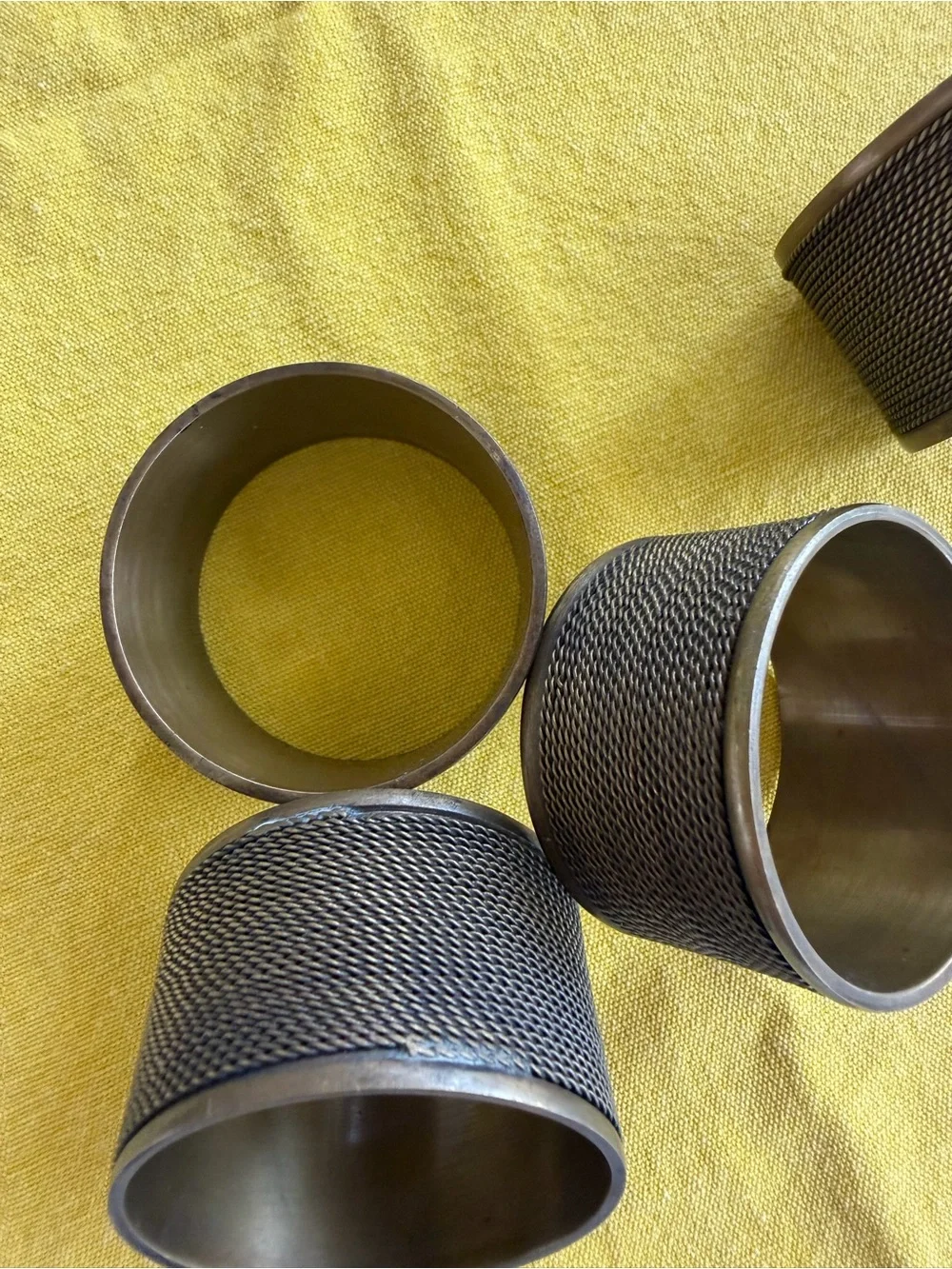Textured Metal Napkin Rings Set of 4 - dark gold tone